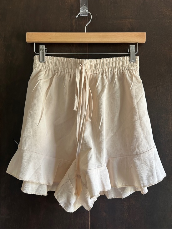 Pants - Cream Ruffle-Hem Shorts with Drawstring Waist